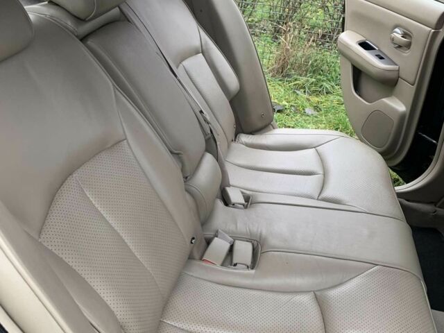 Черный Ниссан Тиида, объемом двигателя 1.5 л и пробегом 261 тыс. км за 5500 $, фото 4 на Automoto.ua