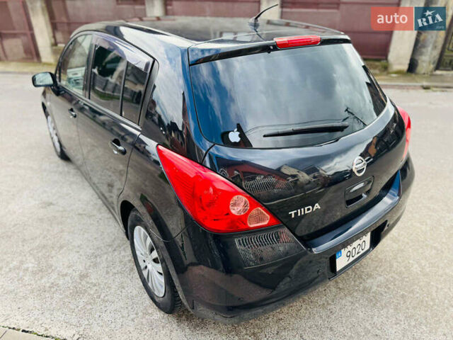 Черный Ниссан Тиида, объемом двигателя 1.6 л и пробегом 187 тыс. км за 5800 $, фото 62 на Automoto.ua