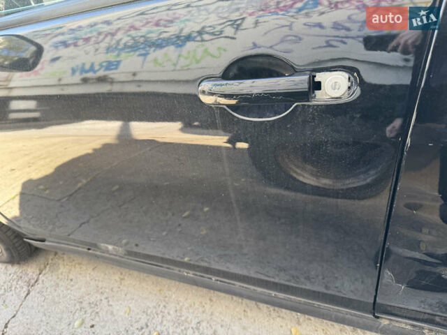 Черный Ниссан Тиида, объемом двигателя 1.6 л и пробегом 195 тыс. км за 5000 $, фото 12 на Automoto.ua