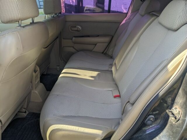 Чорний Ніссан Тііда, об'ємом двигуна 1.6 л та пробігом 209 тис. км за 3750 $, фото 4 на Automoto.ua