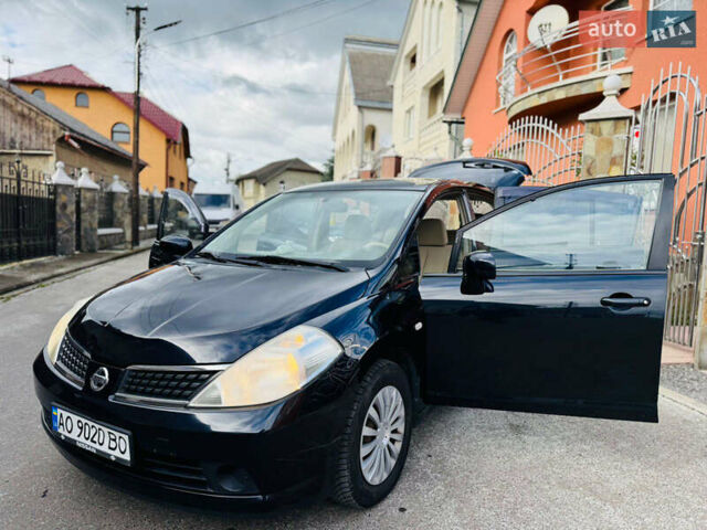 Черный Ниссан Тиида, объемом двигателя 1.6 л и пробегом 187 тыс. км за 5800 $, фото 73 на Automoto.ua