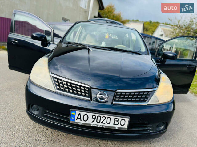Черный Ниссан Тиида, объемом двигателя 1.6 л и пробегом 187 тыс. км за 5800 $, фото 23 на Automoto.ua