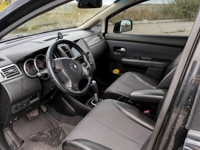 Черный Ниссан Тиида, объемом двигателя 1.6 л и пробегом 2 тыс. км за 6200 $, фото 2 на Automoto.ua