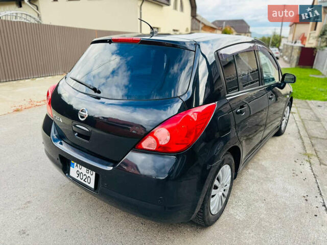 Черный Ниссан Тиида, объемом двигателя 1.6 л и пробегом 187 тыс. км за 5800 $, фото 85 на Automoto.ua