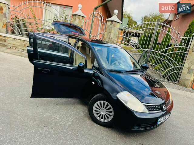 Черный Ниссан Тиида, объемом двигателя 1.6 л и пробегом 187 тыс. км за 5800 $, фото 19 на Automoto.ua