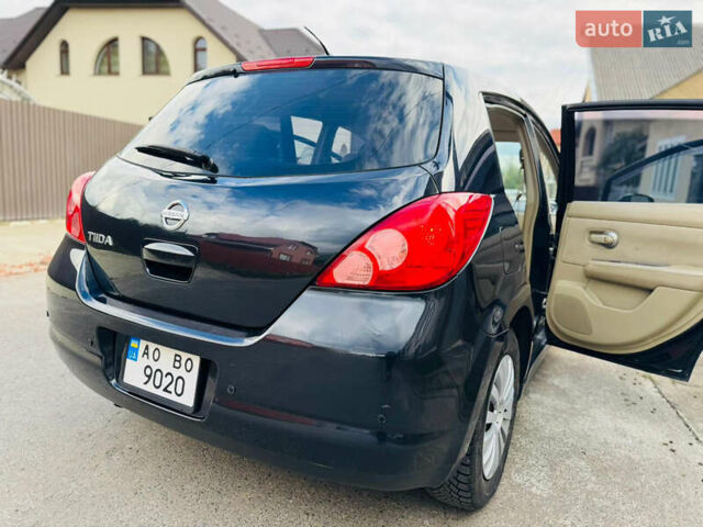 Черный Ниссан Тиида, объемом двигателя 1.6 л и пробегом 187 тыс. км за 5800 $, фото 84 на Automoto.ua