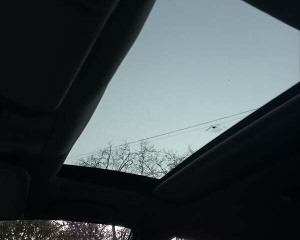 Чорний Ніссан Тііда, об'ємом двигуна 1.8 л та пробігом 215 тис. км за 5800 $, фото 1 на Automoto.ua