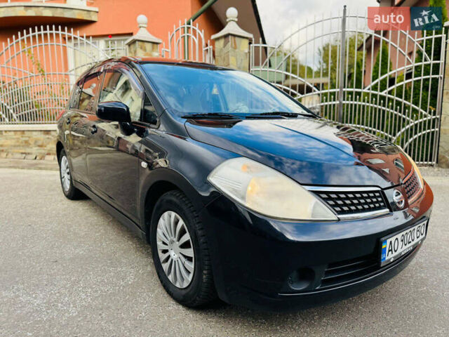 Черный Ниссан Тиида, объемом двигателя 1.6 л и пробегом 187 тыс. км за 5800 $, фото 57 на Automoto.ua