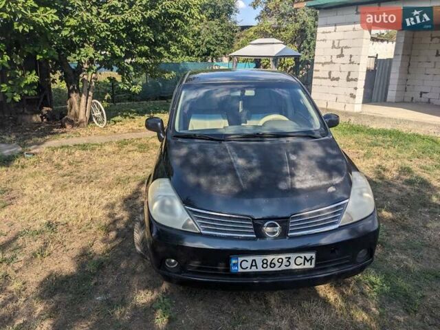 Черный Ниссан Тиида, объемом двигателя 1.6 л и пробегом 209 тыс. км за 4400 $, фото 6 на Automoto.ua