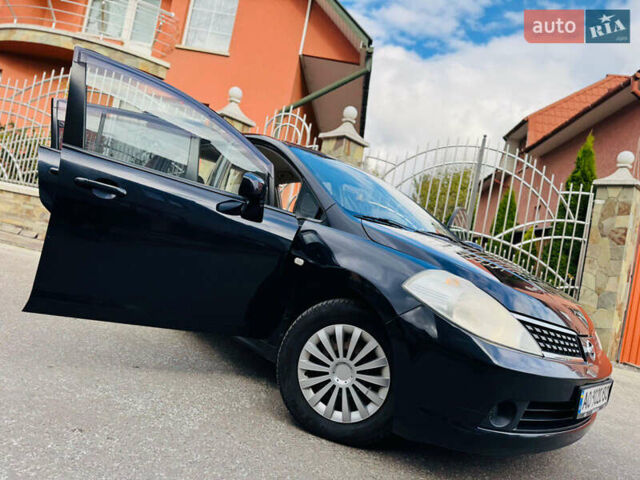 Черный Ниссан Тиида, объемом двигателя 1.6 л и пробегом 187 тыс. км за 5800 $, фото 25 на Automoto.ua