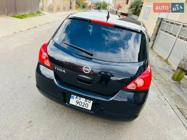 Черный Ниссан Тиида, объемом двигателя 1.6 л и пробегом 187 тыс. км за 5800 $, фото 14 на Automoto.ua