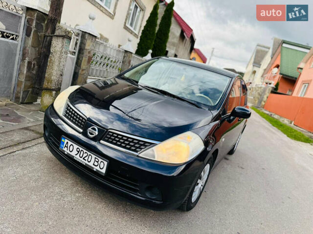 Черный Ниссан Тиида, объемом двигателя 1.6 л и пробегом 187 тыс. км за 5800 $, фото 11 на Automoto.ua