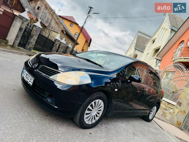 Черный Ниссан Тиида, объемом двигателя 1.6 л и пробегом 187 тыс. км за 5800 $, фото 61 на Automoto.ua