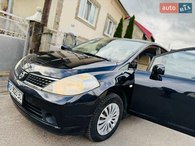 Черный Ниссан Тиида, объемом двигателя 1.6 л и пробегом 187 тыс. км за 5800 $, фото 9 на Automoto.ua
