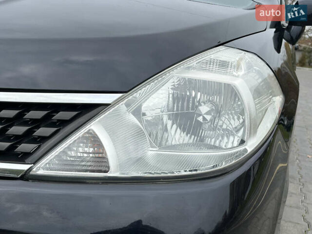 Черный Ниссан Тиида, объемом двигателя 1.6 л и пробегом 172 тыс. км за 6900 $, фото 13 на Automoto.ua