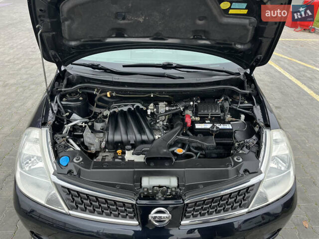 Черный Ниссан Тиида, объемом двигателя 1.6 л и пробегом 172 тыс. км за 6900 $, фото 46 на Automoto.ua