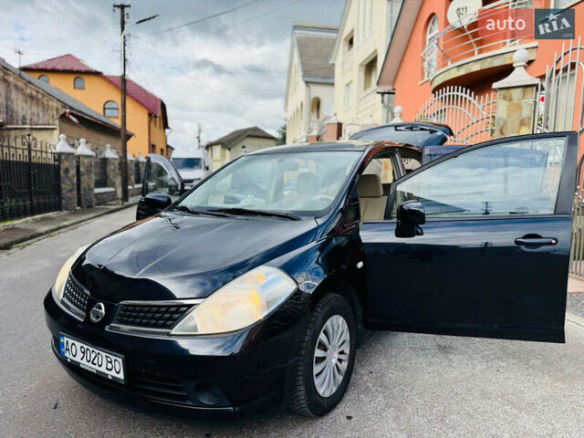 Черный Ниссан Тиида, объемом двигателя 1.6 л и пробегом 187 тыс. км за 5800 $, фото 27 на Automoto.ua