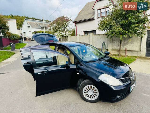 Черный Ниссан Тиида, объемом двигателя 1.6 л и пробегом 187 тыс. км за 5800 $, фото 34 на Automoto.ua