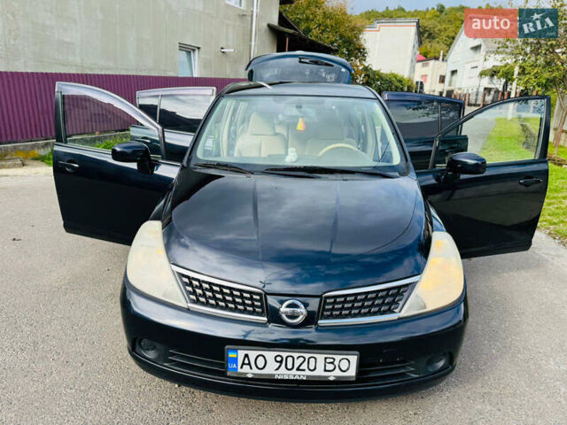 Черный Ниссан Тиида, объемом двигателя 1.6 л и пробегом 187 тыс. км за 5800 $, фото 28 на Automoto.ua