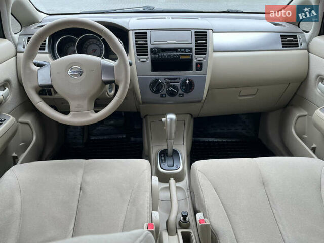 Черный Ниссан Тиида, объемом двигателя 1.6 л и пробегом 172 тыс. км за 6900 $, фото 22 на Automoto.ua