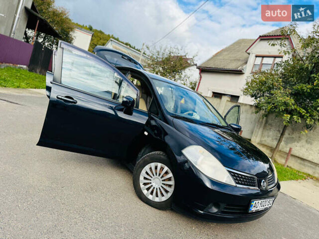 Черный Ниссан Тиида, объемом двигателя 1.6 л и пробегом 187 тыс. км за 5800 $, фото 54 на Automoto.ua