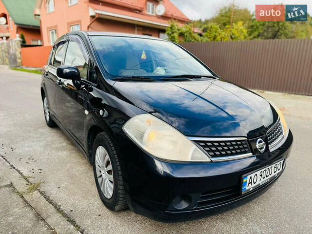 Черный Ниссан Тиида, объемом двигателя 1.6 л и пробегом 187 тыс. км за 5800 $, фото 83 на Automoto.ua