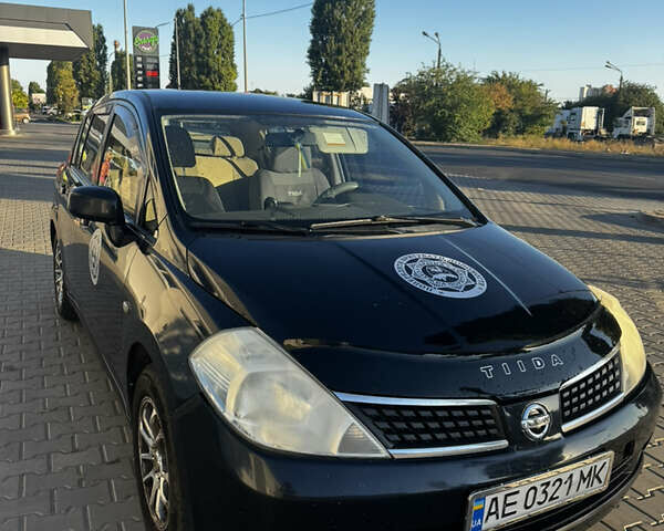Чорний Ніссан Тііда, об'ємом двигуна 1.6 л та пробігом 179 тис. км за 5617 $, фото 2 на Automoto.ua