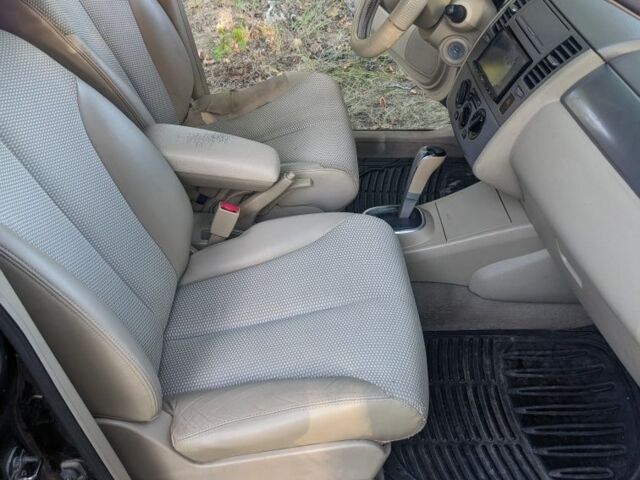 Чорний Ніссан Тііда, об'ємом двигуна 1.6 л та пробігом 209 тис. км за 3750 $, фото 7 на Automoto.ua