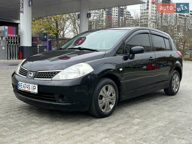 Черный Ниссан Тиида, объемом двигателя 1.6 л и пробегом 172 тыс. км за 6900 $, фото 1 на Automoto.ua