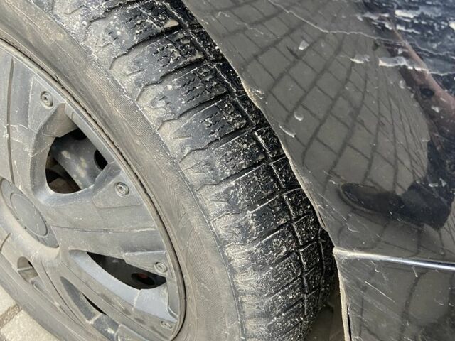 Черный Ниссан Тиида, объемом двигателя 1.6 л и пробегом 200 тыс. км за 4500 $, фото 5 на Automoto.ua