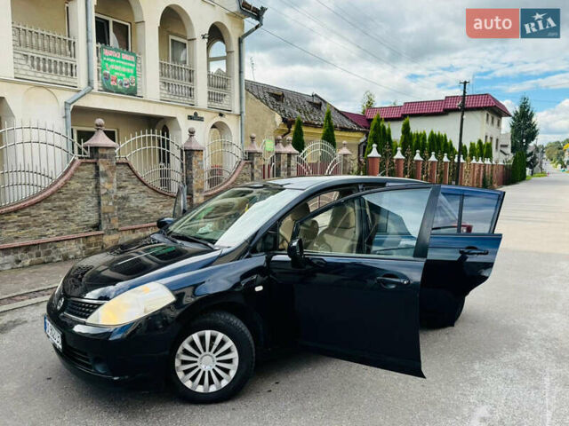 Черный Ниссан Тиида, объемом двигателя 1.6 л и пробегом 187 тыс. км за 5800 $, фото 47 на Automoto.ua