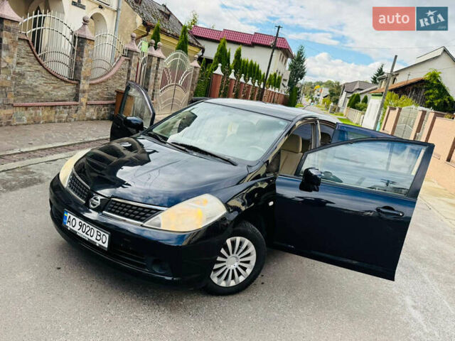 Черный Ниссан Тиида, объемом двигателя 1.6 л и пробегом 187 тыс. км за 5800 $, фото 74 на Automoto.ua