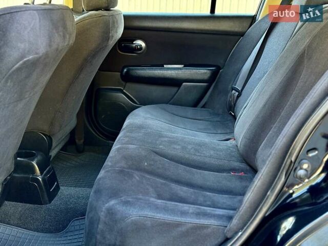 Черный Ниссан Тиида, объемом двигателя 1.6 л и пробегом 257 тыс. км за 5999 $, фото 17 на Automoto.ua