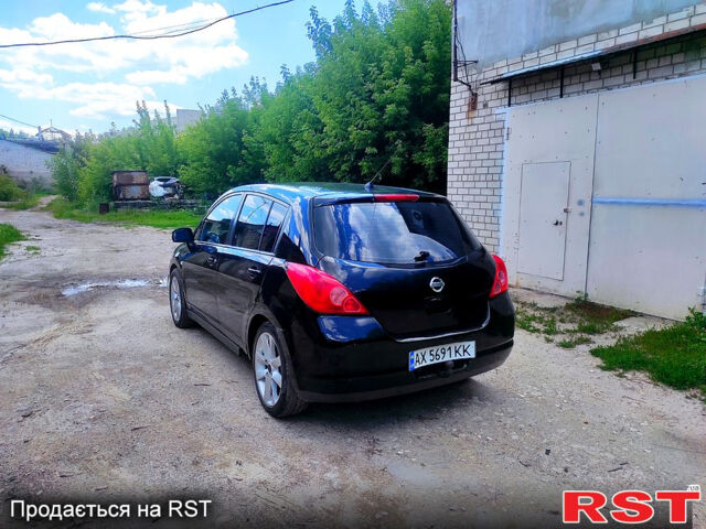 Черный Ниссан Тиида, объемом двигателя 1.8 л и пробегом 246 тыс. км за 3500 $, фото 2 на Automoto.ua