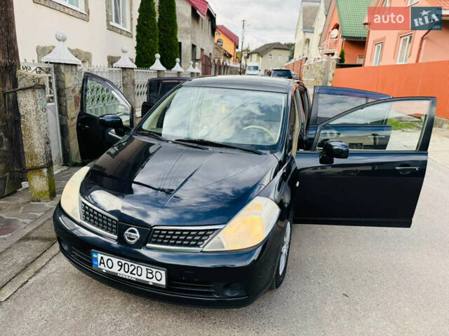 Черный Ниссан Тиида, объемом двигателя 1.6 л и пробегом 187 тыс. км за 5800 $, фото 66 на Automoto.ua