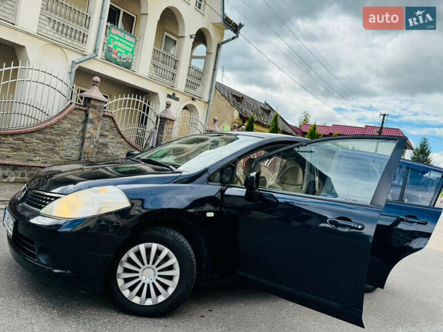 Черный Ниссан Тиида, объемом двигателя 1.6 л и пробегом 187 тыс. км за 5800 $, фото 75 на Automoto.ua