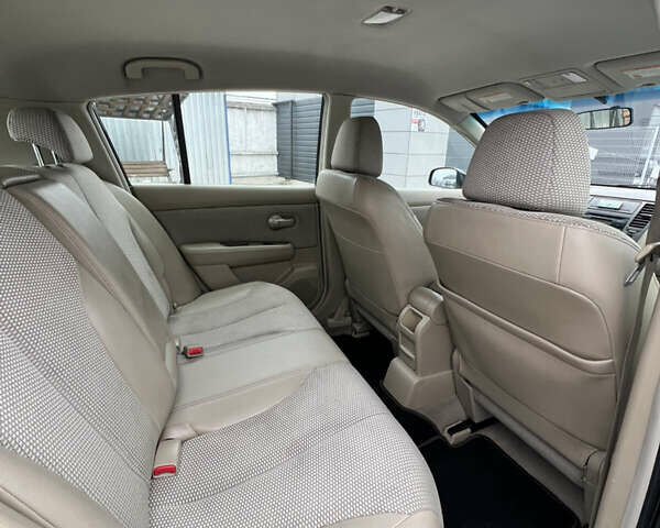 Чорний Ніссан Тііда, об'ємом двигуна 1.6 л та пробігом 188 тис. км за 5800 $, фото 20 на Automoto.ua