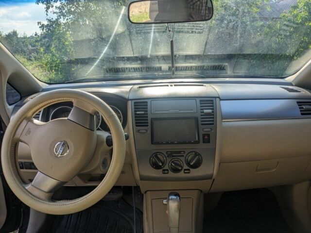 Чорний Ніссан Тііда, об'ємом двигуна 1.6 л та пробігом 209 тис. км за 3750 $, фото 3 на Automoto.ua