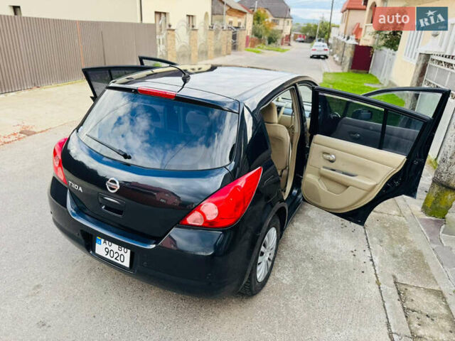 Черный Ниссан Тиида, объемом двигателя 1.6 л и пробегом 187 тыс. км за 5800 $, фото 64 на Automoto.ua