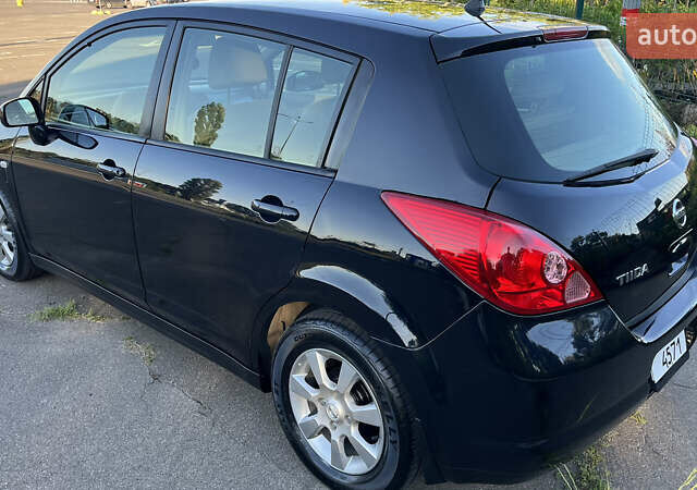 Чорний Ніссан Тііда, об'ємом двигуна 1.6 л та пробігом 136 тис. км за 6700 $, фото 22 на Automoto.ua