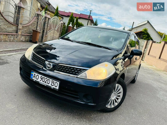 Черный Ниссан Тиида, объемом двигателя 1.6 л и пробегом 187 тыс. км за 5800 $, фото 79 на Automoto.ua