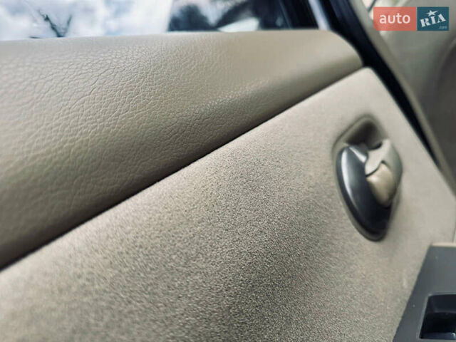 Черный Ниссан Тиида, объемом двигателя 1.6 л и пробегом 187 тыс. км за 5800 $, фото 36 на Automoto.ua