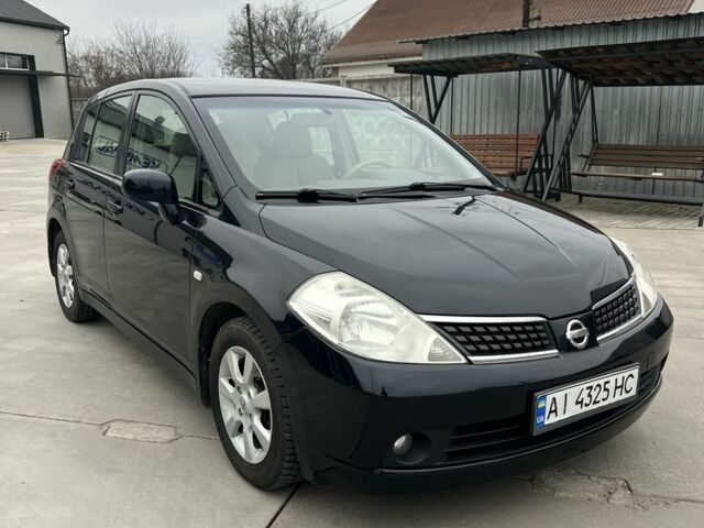 Черный Ниссан Тиида, объемом двигателя 1.6 л и пробегом 188 тыс. км за 5800 $, фото 3 на Automoto.ua