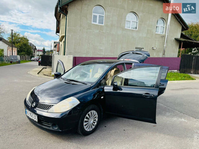 Черный Ниссан Тиида, объемом двигателя 1.6 л и пробегом 187 тыс. км за 5800 $, фото 29 на Automoto.ua