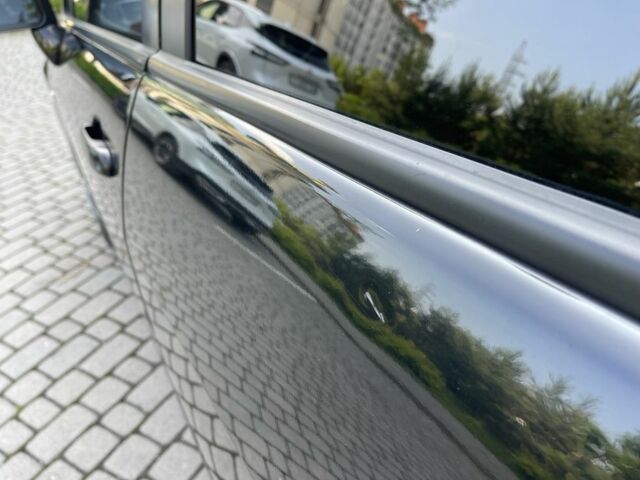 Черный Ниссан Тиида, объемом двигателя 1.8 л и пробегом 140 тыс. км за 6300 $, фото 4 на Automoto.ua