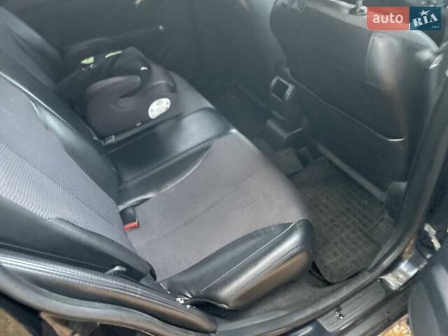 Черный Ниссан Тиида, объемом двигателя 1.6 л и пробегом 188 тыс. км за 6700 $, фото 11 на Automoto.ua