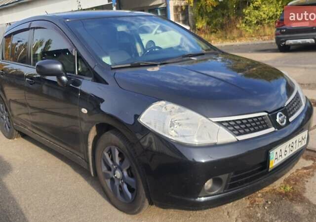 Черный Ниссан Тиида, объемом двигателя 1.6 л и пробегом 229 тыс. км за 5900 $, фото 2 на Automoto.ua