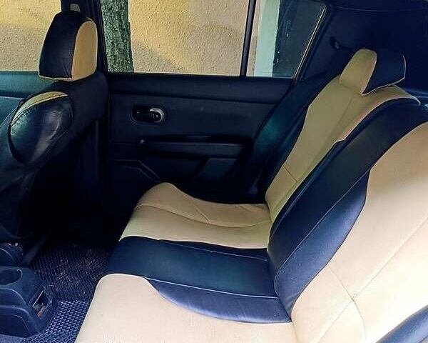 Чорний Ніссан Тііда, об'ємом двигуна 1.6 л та пробігом 203 тис. км за 5300 $, фото 5 на Automoto.ua