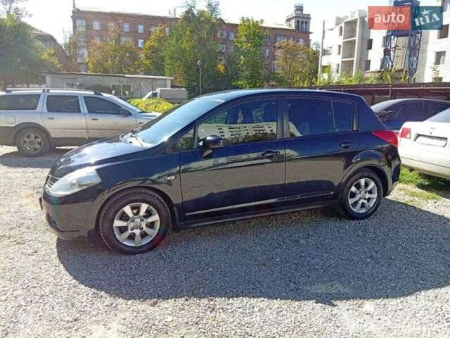 Черный Ниссан Тиида, объемом двигателя 1.6 л и пробегом 118 тыс. км за 5200 $, фото 1 на Automoto.ua