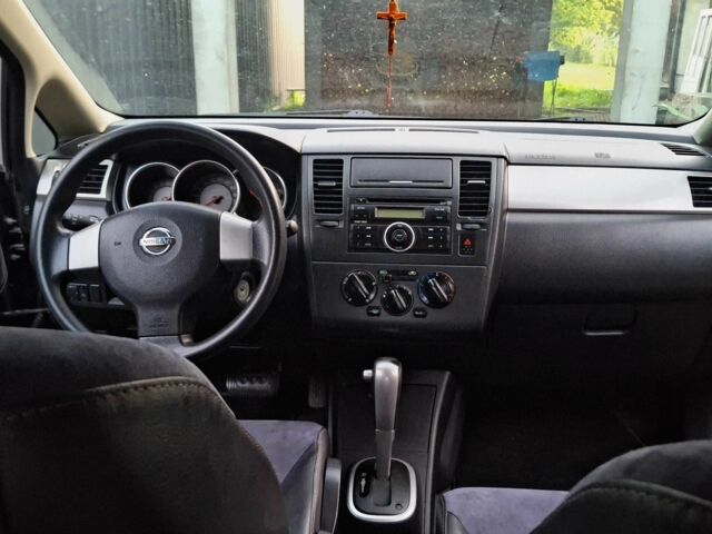 Черный Ниссан Тиида, объемом двигателя 0 л и пробегом 110 тыс. км за 7200 $, фото 11 на Automoto.ua